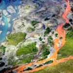 A surpreendente razão pela qual rios árticos estão se tornando laranja enferrujado